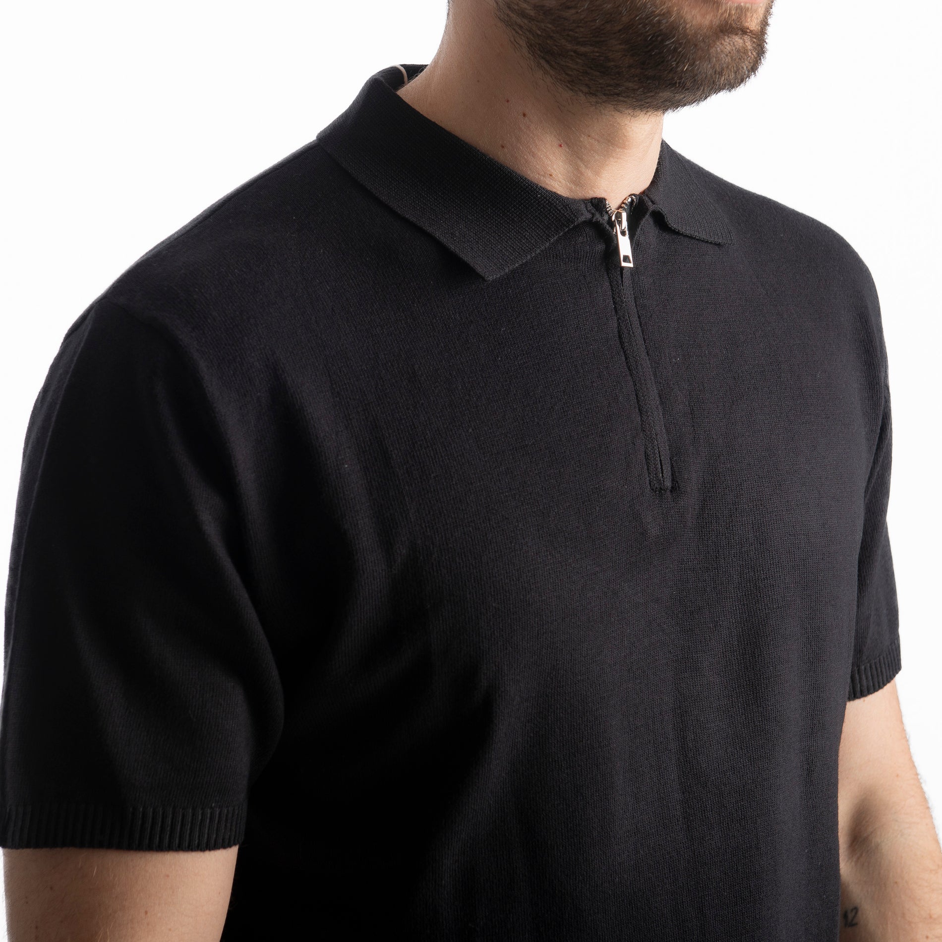 Polo con Zip Uomo Nera